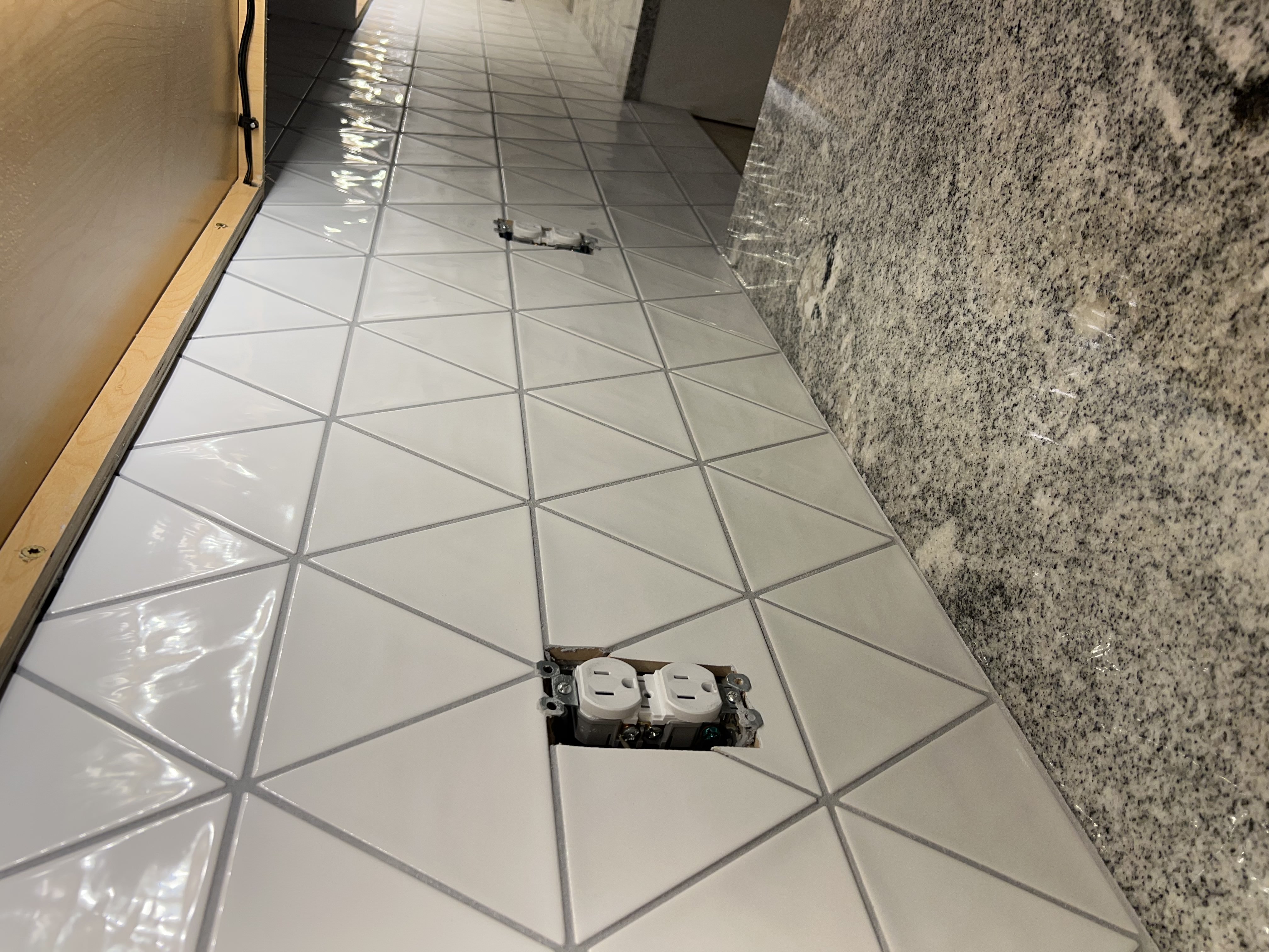 Tile backsplash installation by Solid Home